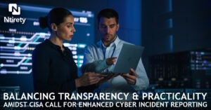 Two people in an office looking at a computer.